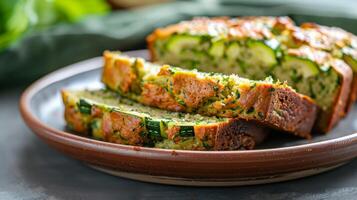 Zucchini bread slices on a rustic plate offer a healthy and delicious baked food option photo