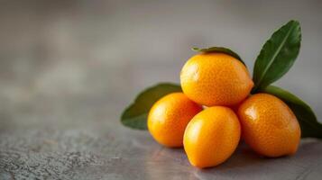 Kumquat close-up with vibrant, ripe, juicy, and fresh citrus fruit with a healthy organic look photo