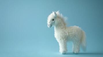 Plush white horse toy standing isolated on a light blue background with soft texture and playful mane photo