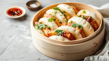 Steamed bao buns in bamboo steamer with Asian cuisine elements photo