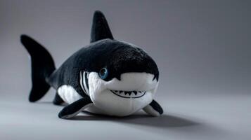 Shark plush toy with a cute and soft stuffed animal design features marine predator characteristics photo