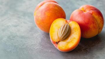 Fresh juicy ripe nectarine with vibrant red and yellow pulp in a close-up image photo