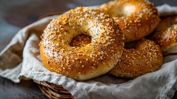 Golden delicious bagels with sesame and poppy seeds perfect for a healthy breakfast snack photo