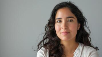 Portrait of a Chilean woman with a natural beauty and an elegant smile showcasing femininity and confidence photo