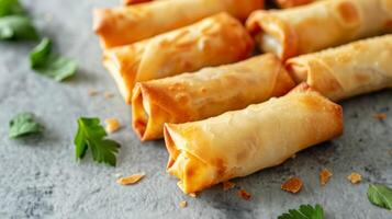 Egg rolls fried to a crispy golden perfection with herbs in an Asian cuisine concept photo