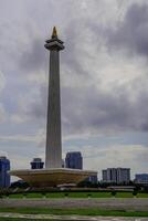 Central Jakarta, January 30, 2024 - beautiful view of the national monument with clear skies during the day. photo