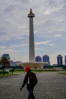 Central Jakarta, January 30, 2024 - beautiful view of the national monument with clear skies during the day. photo