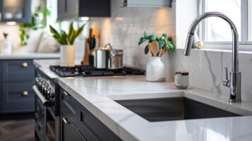 Modern kitchen with quartz countertops, interior design, luxury faucet, and sleek cabinets photo