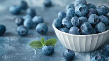 Blueberries in the bowl featuring freshness, fruit, organic, healthy and antioxidants with a touch of nutrition photo