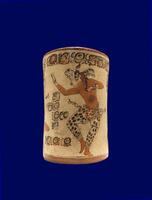 Late Classic AD 600 to 900 cylindrical polychrome jars with complex anthropomorphic, geometric, and glyph painted decoration. Polychrome pottery was an elaborate, advanced art form of the Maya. photo