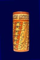 Late Classic AD 600 to 900 cylindrical polychrome jars with complex anthropomorphic, geometric, and glyph painted decoration. Polychrome pottery was an elaborate, advanced art form of the Maya. photo