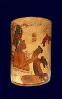 Late Classic AD 600 to 900 cylindrical polychrome jars with complex anthropomorphic, geometric, and glyph painted decoration. Polychrome pottery was an elaborate, advanced art form of the Maya. photo