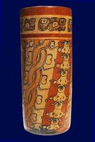 Late Classic AD 600 to 900 cylindrical polychrome jars with complex anthropomorphic, geometric, and glyph painted decoration. Polychrome pottery was an elaborate, advanced art form of the Maya. photo