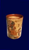 Late Classic AD 600 to 900 cylindrical polychrome jars with complex anthropomorphic, geometric, and glyph painted decoration. Polychrome pottery was an elaborate, advanced art form of the Maya. photo