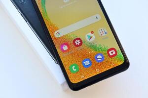 KYIV, UKRAINE - 4 MAY, 2023 Samsung Galaxy A04 Android smartphone has 6.5-inch PLS LCD panel with Infinity-V design photo