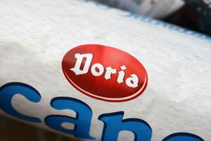 KYIV, UKRAINE - 4 MAY, 2023 Doria logo on cardboard pack of italian food photo