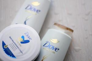 KYIV, UKRAINE - FEBRUARY 27, 2024 Production of Dove is a personal care brand by Unilever photo