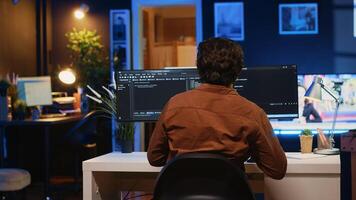 Developer arriving in apartment office with coffee mug in hand, ready to start coding on computer. IT specialist begins teleworking job shift, holding cup of tea, upgrading company software, camera A photo