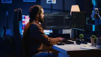 Programmer developing code on computer screen while in personal office using java programming languages. IT admin working with software tool, fixing database errors while working from home, camera A photo