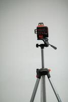Laser level on a tripod for measurement photo