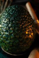 Decorative green lush egg dragon photo