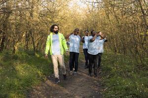 As the operation for the missing person is getting worse, captain of the rescue operation squad leads his team into the forest in search of clues. Lifesavers screaming for the lost civilians name. photo