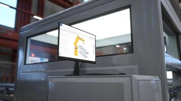 Focus on PC monitor showing controls for large machine in blurry background in warehouse. Close up on computer display used to perform tasks on CNC machinery in factory, 3D render photo