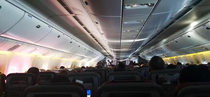 Concept shot of the inside of a passenger airplane. Transport photo