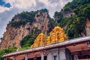 Statue of Lord Muragan and entrance at Batu Caves in Kuala Lumpur, Malaysia. photo