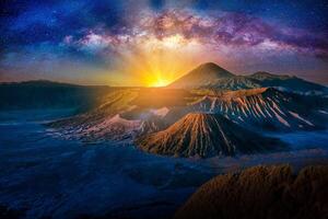 Mount Bromo volcano at sunrise with milky way in Bromo Tengger Semeru National Park, East Java, Indonesia. photo