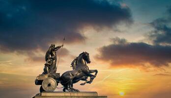 Statue of Boadicea Boudicca Queen at sunset in London, UK photo