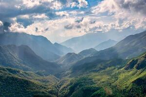The peaks mountains with blue sky in Sa Pa, Vietnam. photo