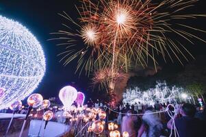 The colorful display of fireworks celebrates the fun and happiness of the night. photo