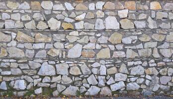 Stone wall texture block rustic stone old background texture photo