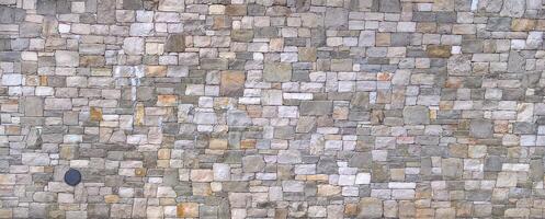 Stone wall texture block rustic stone old background texture photo