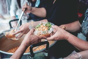 Sharing food with the poor. Ideas for helping with hunger problems photo