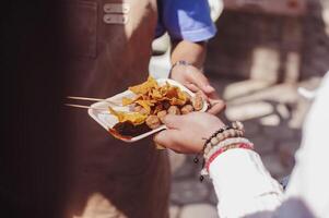 Sharing warm food for homeless and homeless people photo