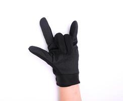 Black cloth palm gloves with anti-slip grip, isolated on white background. photo