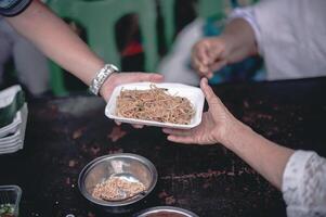 Sharing food with the poor. Ideas for helping with hunger problems photo