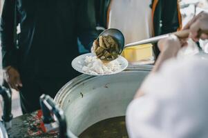 Sharing food with the poor. Ideas for helping with hunger problems photo