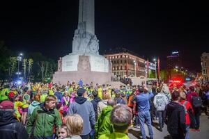 Vibrant Night Scene Celebrating Latvia's EU Accession, Riga photo