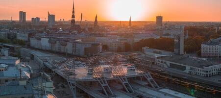 Huge Rail Baltic construction sight project in progress in Riga, Latvia. Building a main central train station in the center of Riga. Aerial view. photo