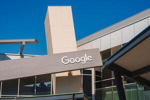 Modern building with prominently displayed Google logo, contemporary design. photo