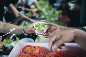 The concept of sharing. Participation in sharing food for the poor photo