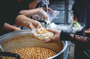 Sharing food with the poor. Ideas for helping with hunger problems photo