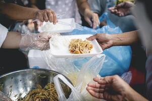 Sharing food with the poor. Ideas for helping with hunger problems photo