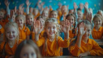 Group of Joyful Elementary School Children in Matching Outfits Raising Hands in Classroom photo