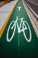 Symbols on the road surface for bicycles photo