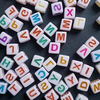 Colorful letter cubes, toy and education photo