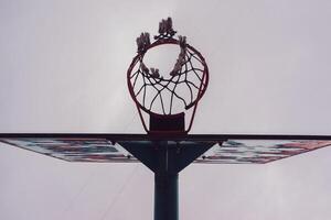 old street basket hoop, sports equipment photo